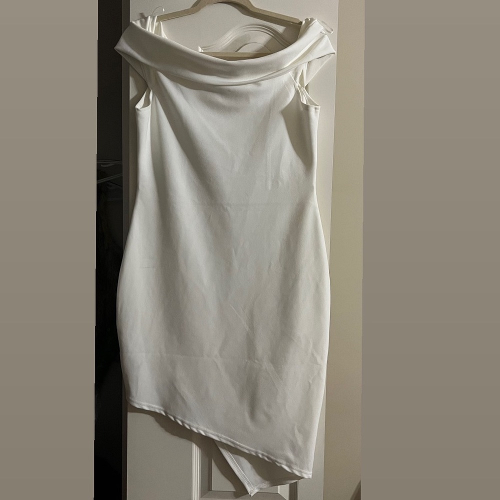 The dress is from revamped and fits tight on skin but very elegant!!